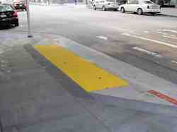 Photo 2.1.5.2. Curb Ramp at Intersection.